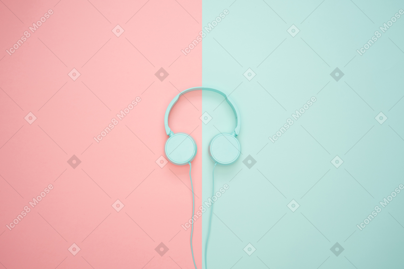 Blaue kopfhörer über kontrasthintergrund