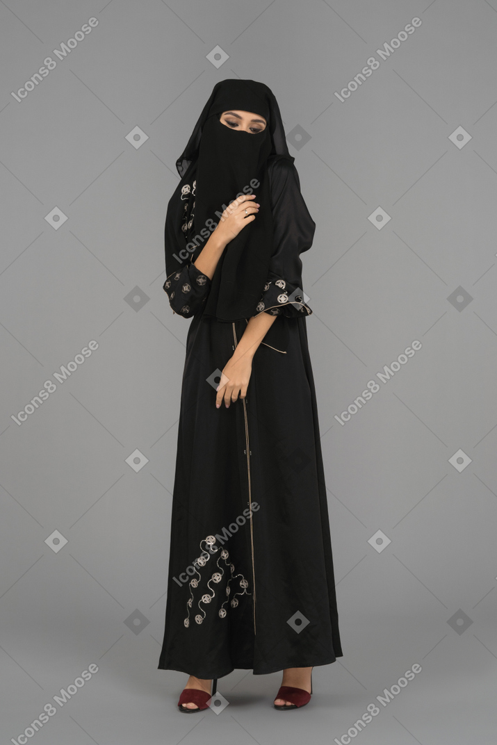 A young muslim woman posing in niqab