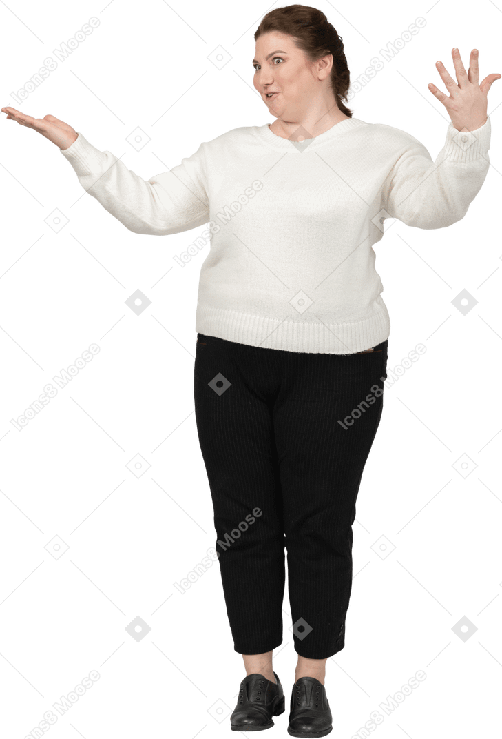 Front view of a happy plump woman in casual clothes gesturing