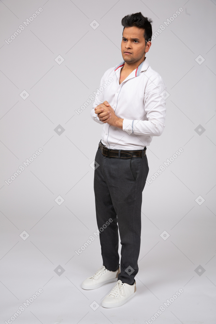 Man in white shirt standing