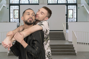 A couple of men hugging