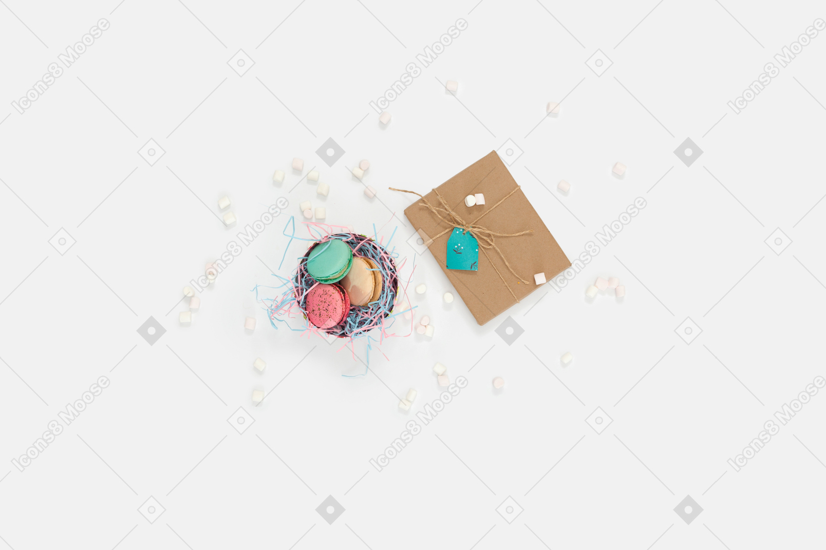 Basket with macaroons on shredded paper