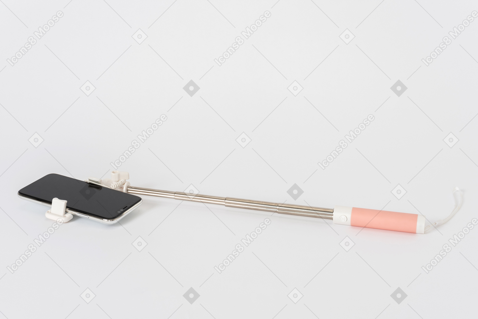 Селфи палочка с смартфона на белом фоне