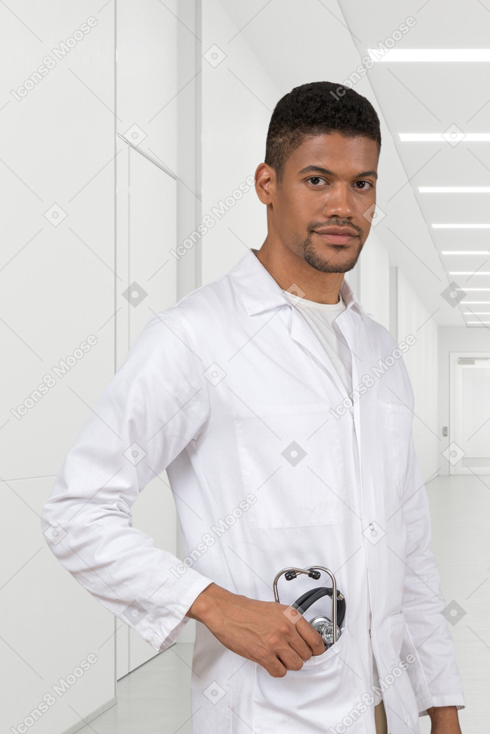 Doctor taking a stethoscope out of his pocket