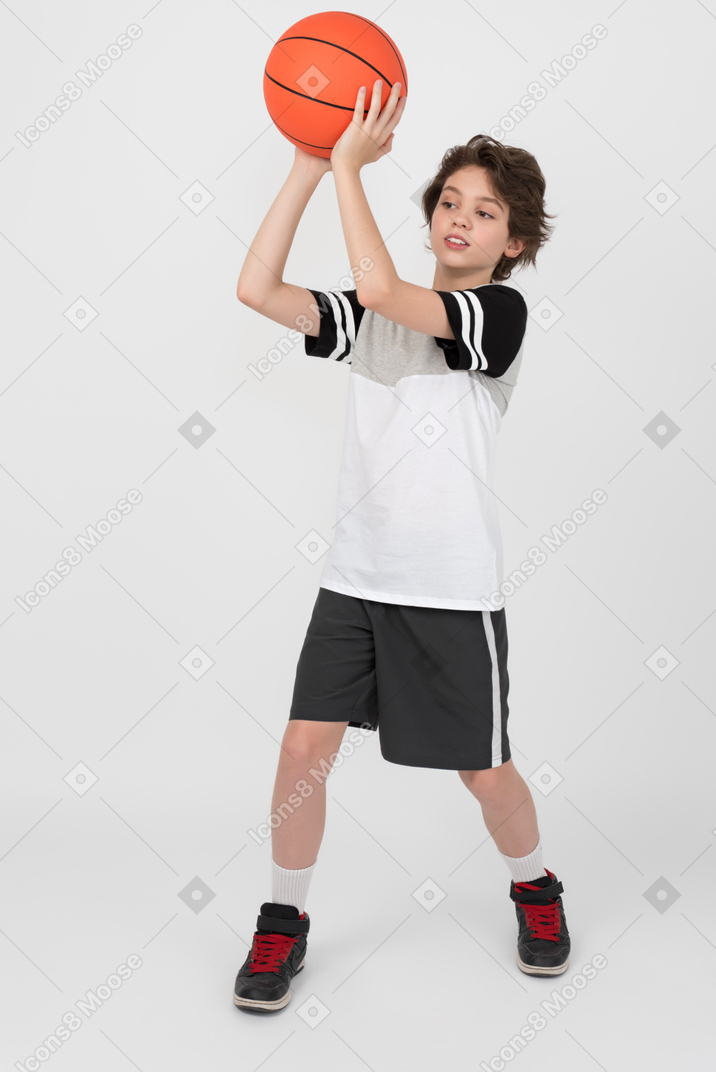 Boy is throwing a ball