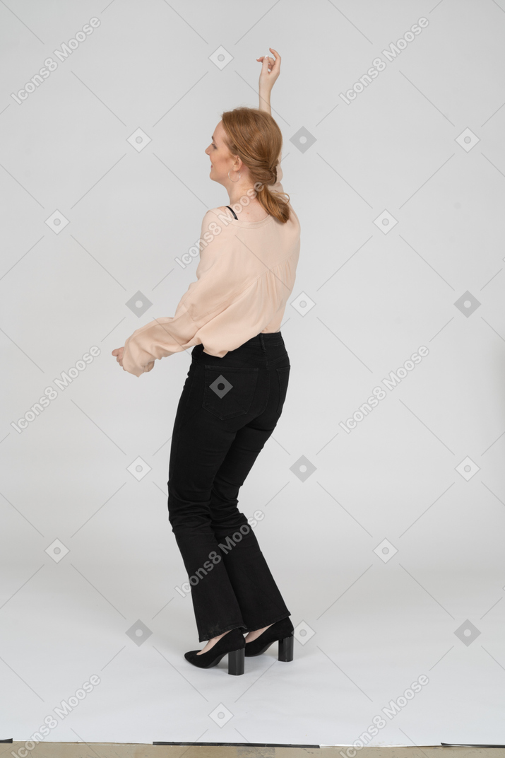 Woman in beautiful blouse dancing