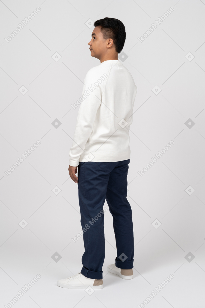 Back view of man in white longsleeve shirt and jeans
