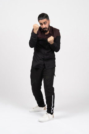 A young man boxing