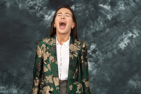 Close-up business woman screaming desperately