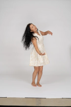 Woman in beautiful dress standing