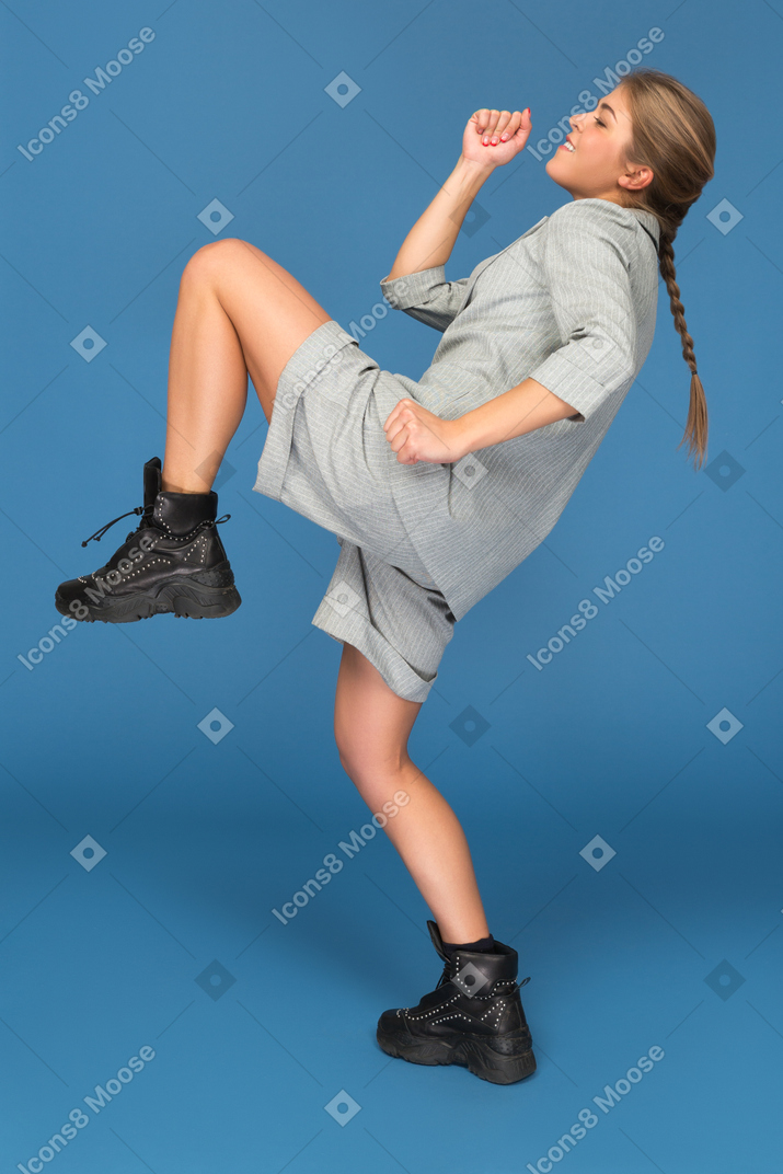 Young woman practicing martial arts