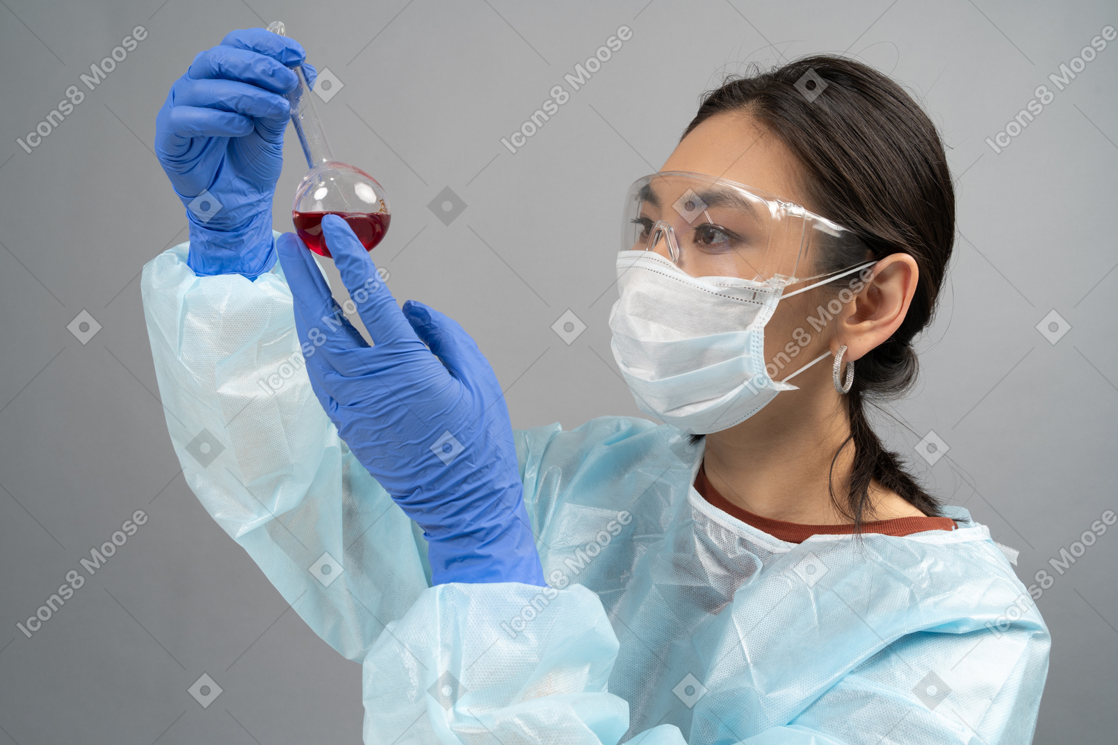 Medical specialist looking at tube