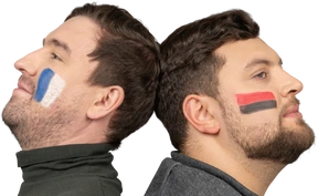 Portrait of two male football fans