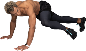 Three-quarter view of a shirtless afro man making push-ups