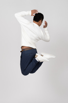 Man in casual clothes jumping