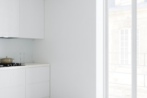 White kitchen with large window