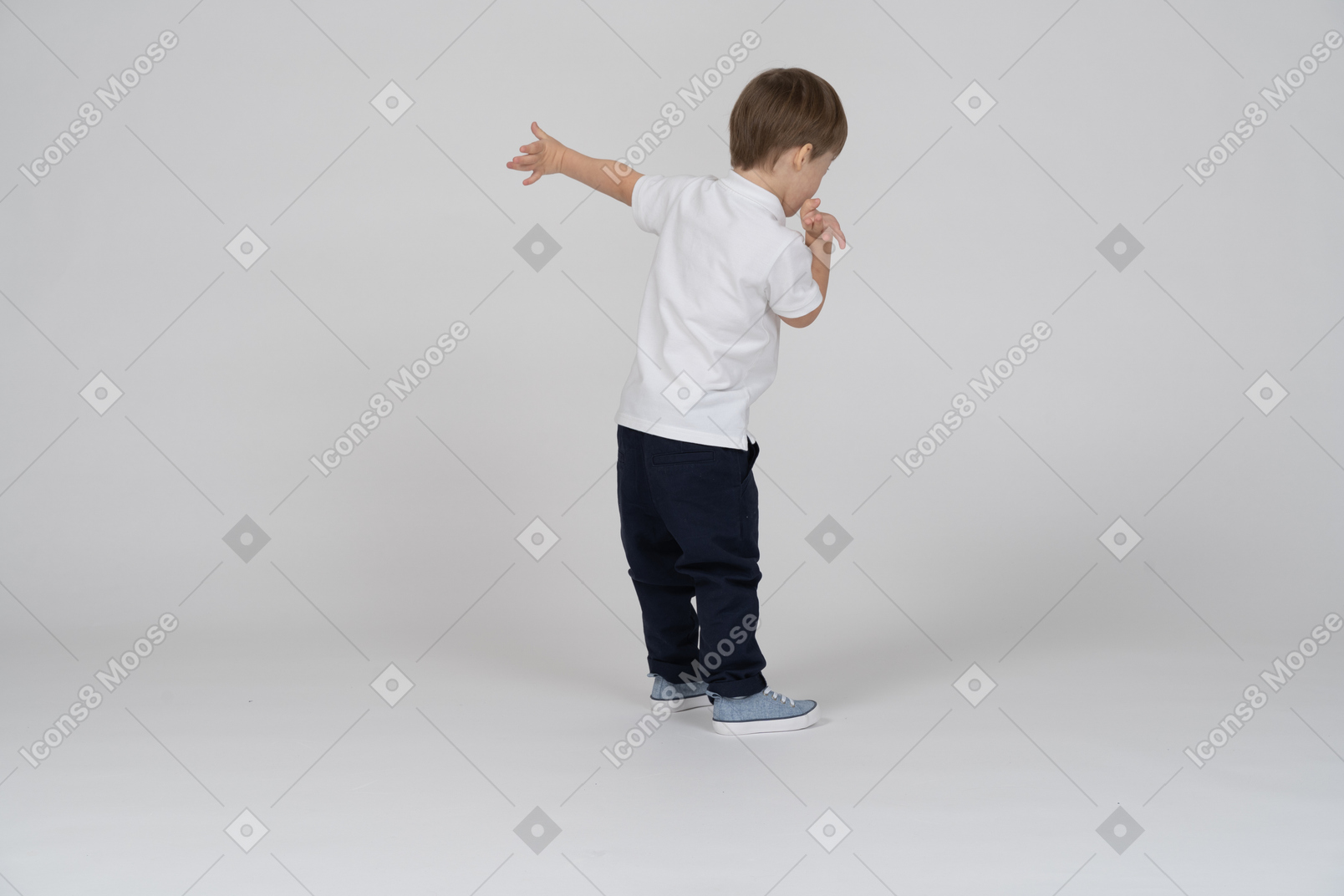 Rear view of a little boy gesturing