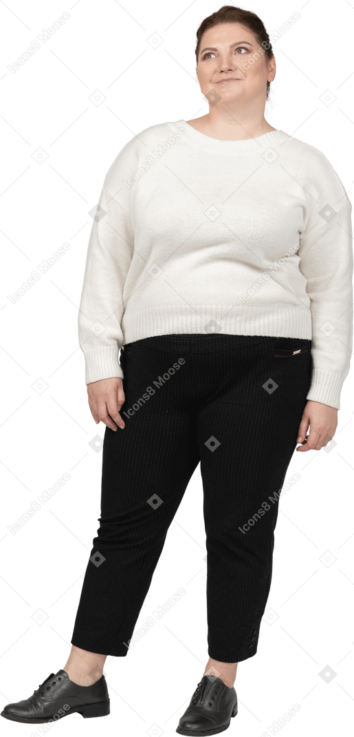 Plus size woman in casual clothes looking up