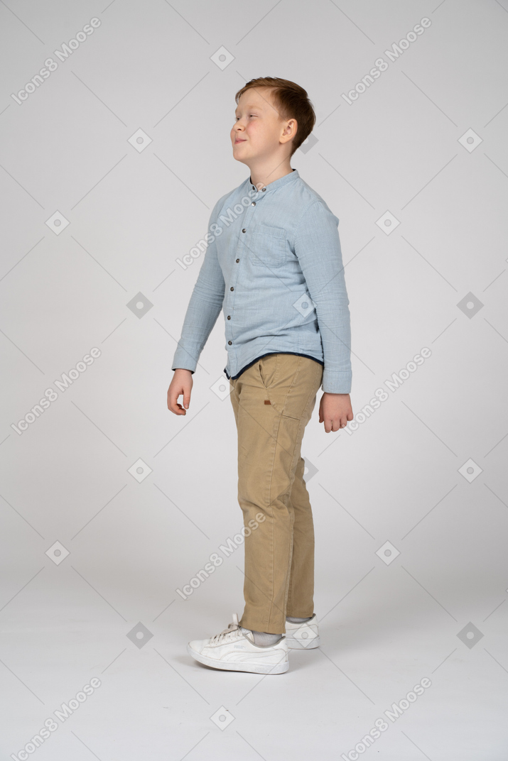 Side view of a boy walking