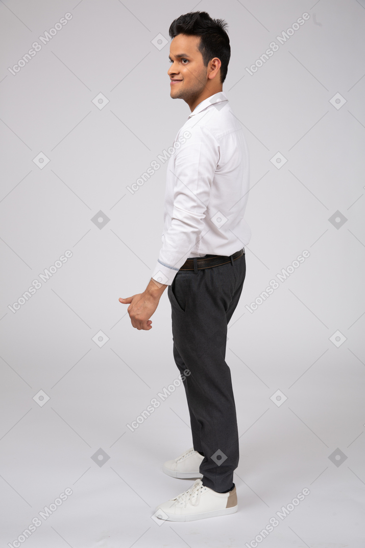 Man in white shirt standing