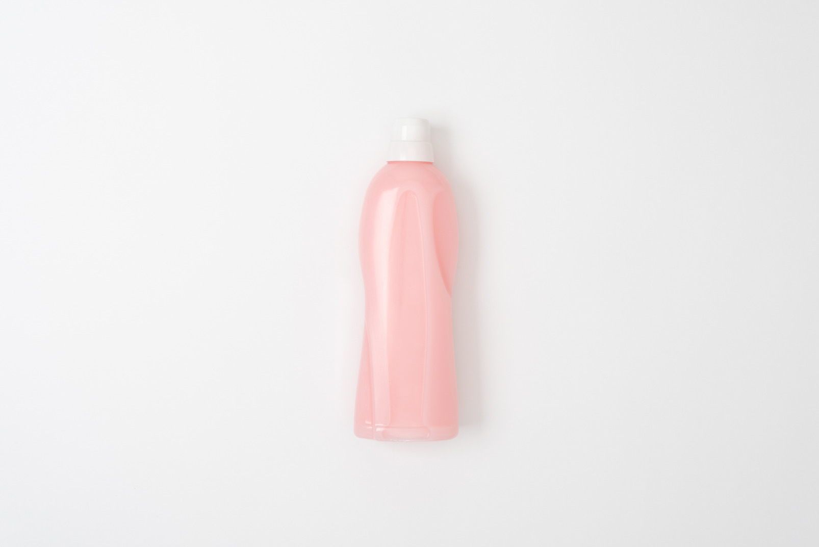 Pink household bottle with white cap