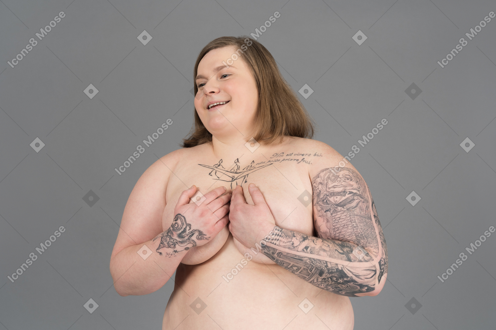 Plump woman holding her breasts