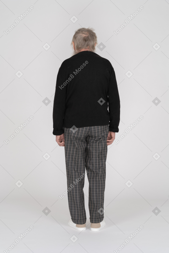 Back view of an old man standing