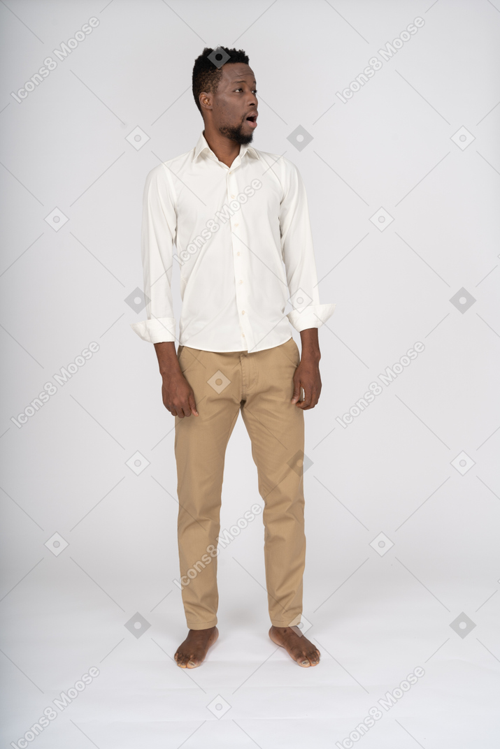 Man in white shirt standing