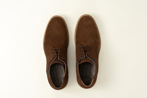 Brown shoes on a white background