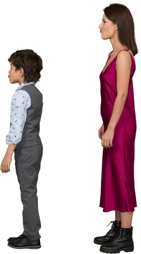 Woman in red dress and boy in profile