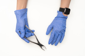 Female hands holding medical equipment