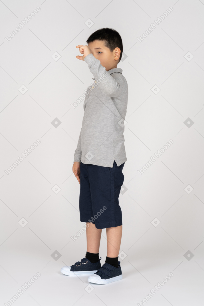 Boy measuring