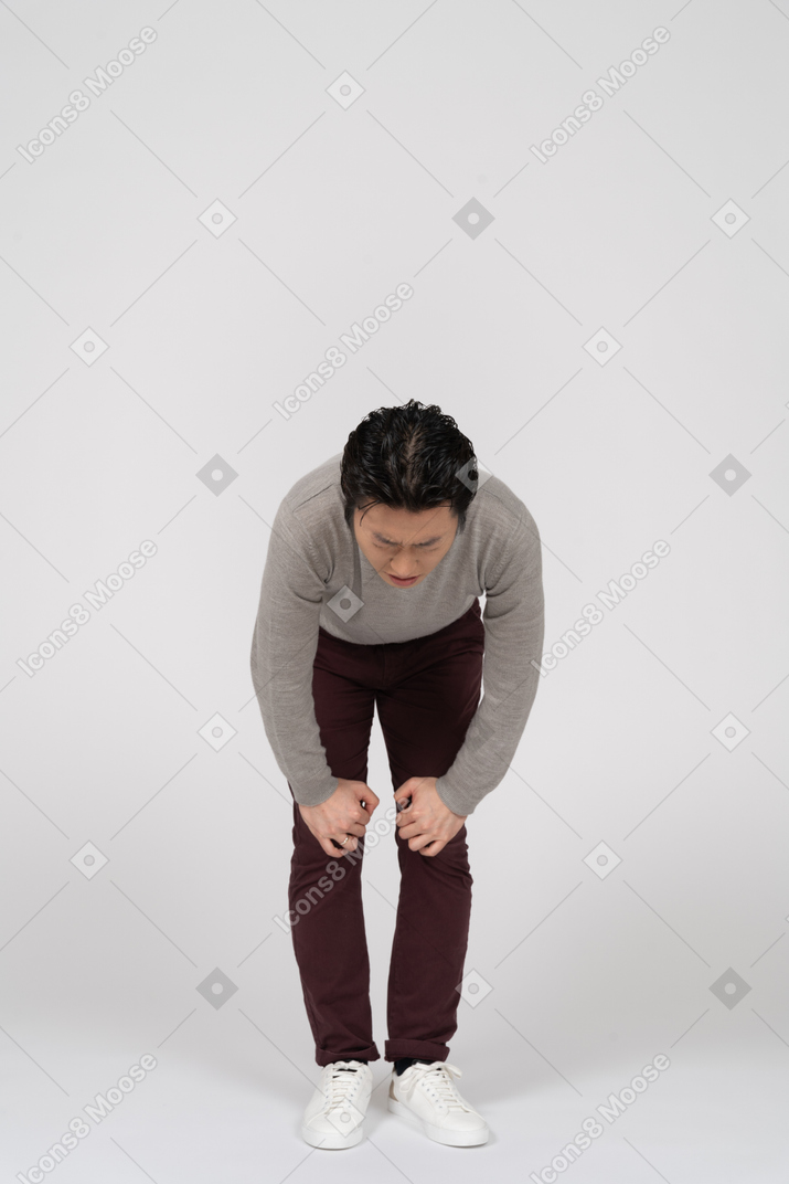 Man in casual clothes posing