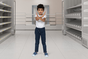 Boy standing in a supermarket