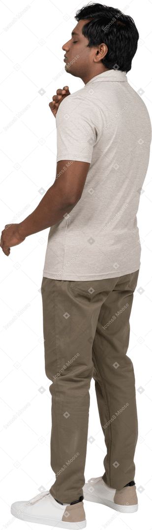 Man in casual clothes posing