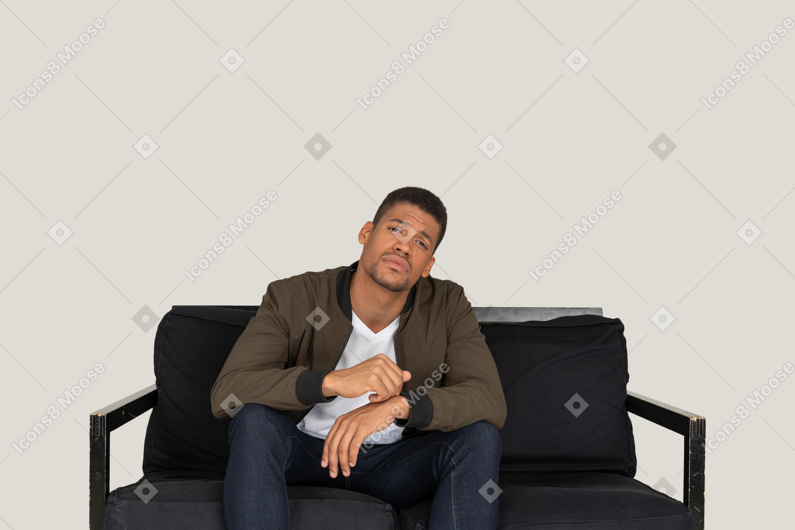 Young man sitting on the sofa