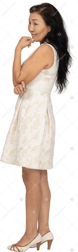 Woman in beautiful dress standing