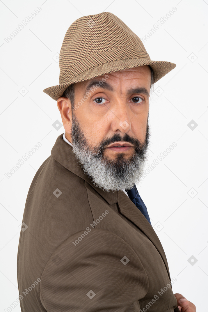 Mature handsome man wearing a hat