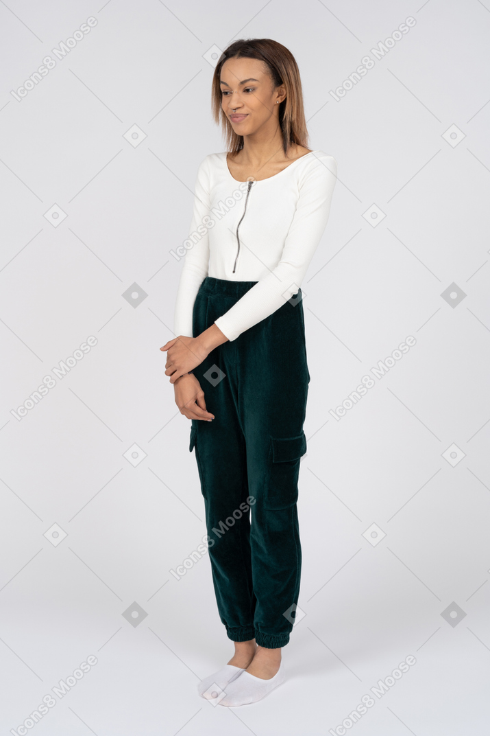 Woman in casual clothes standing