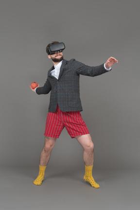 A young man enjoying vr glasses