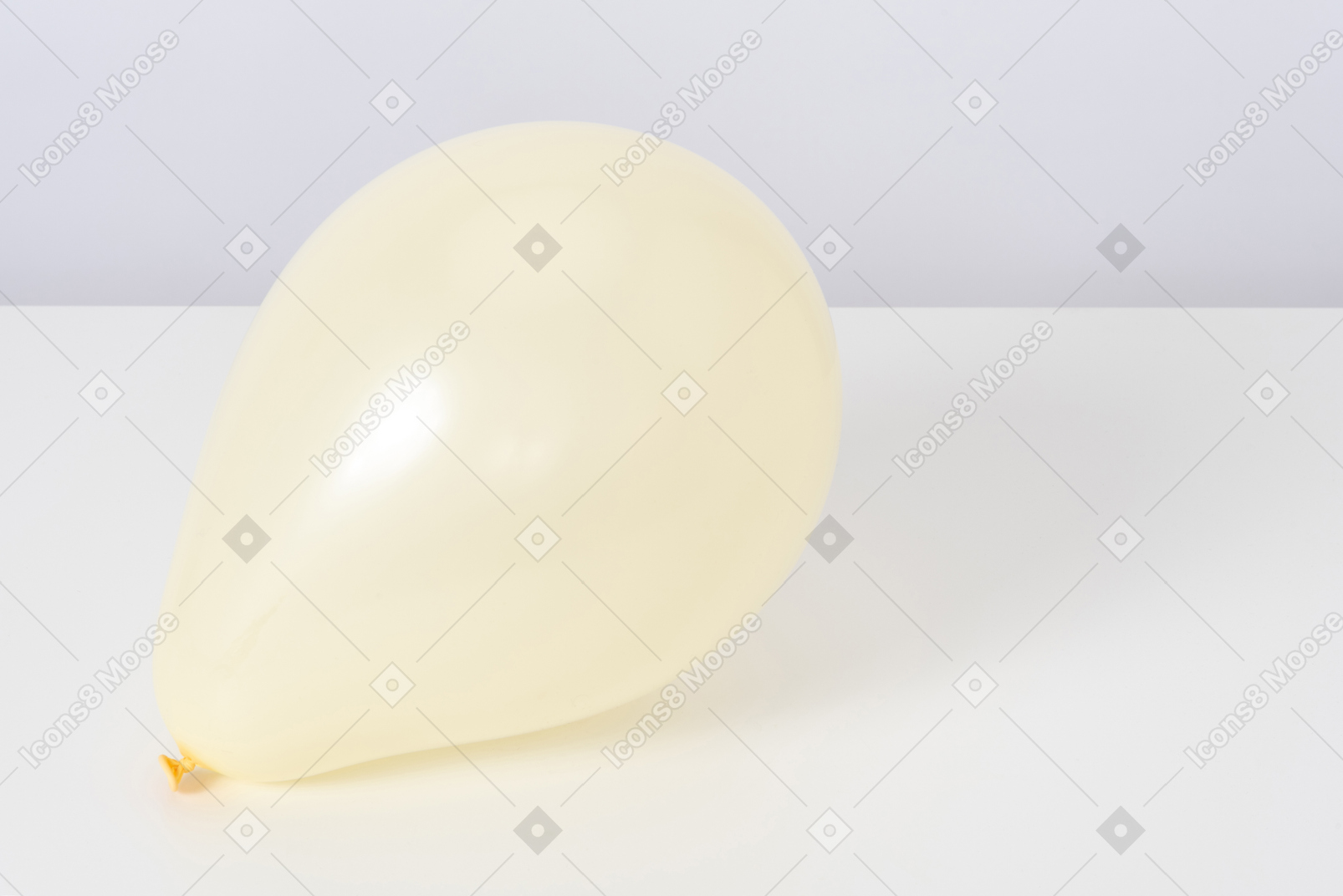 Yellow balloon on a white background