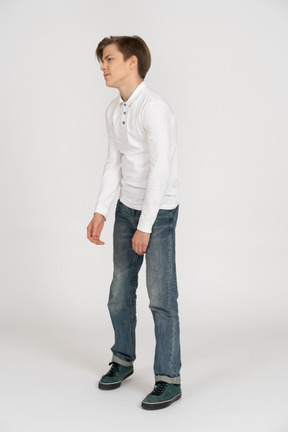 Young man in casual clothes standing