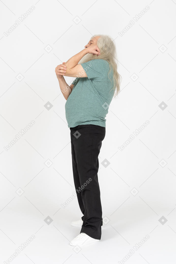 Side view of old man feeling pain in elbow