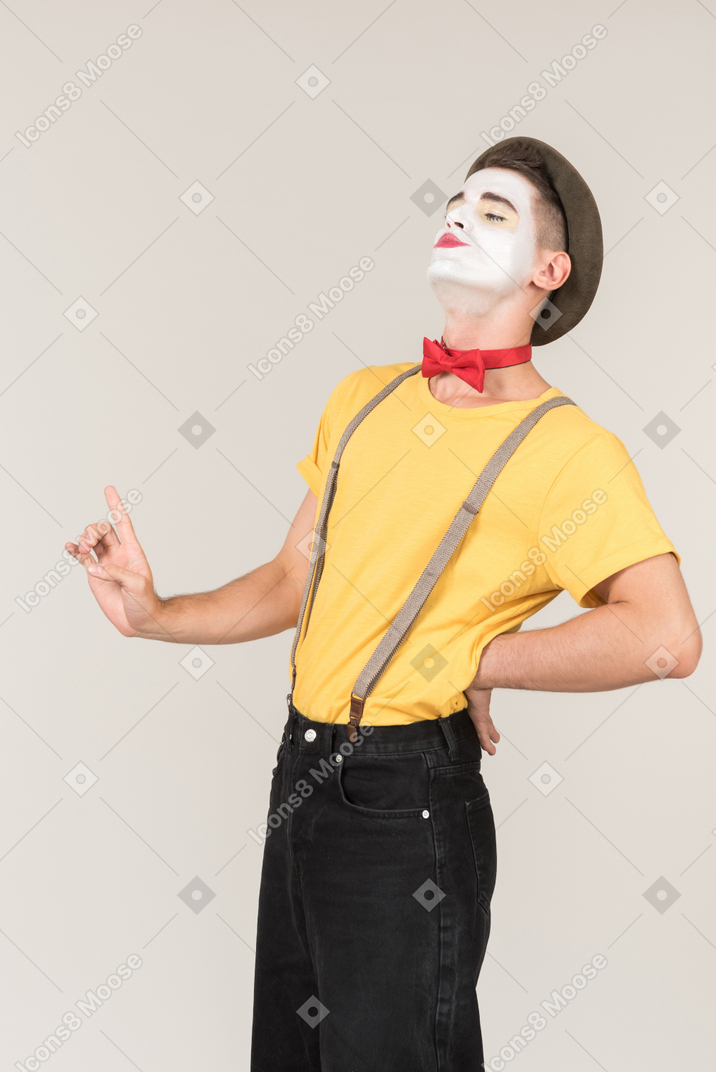 Male clown holding his finger up in denial
