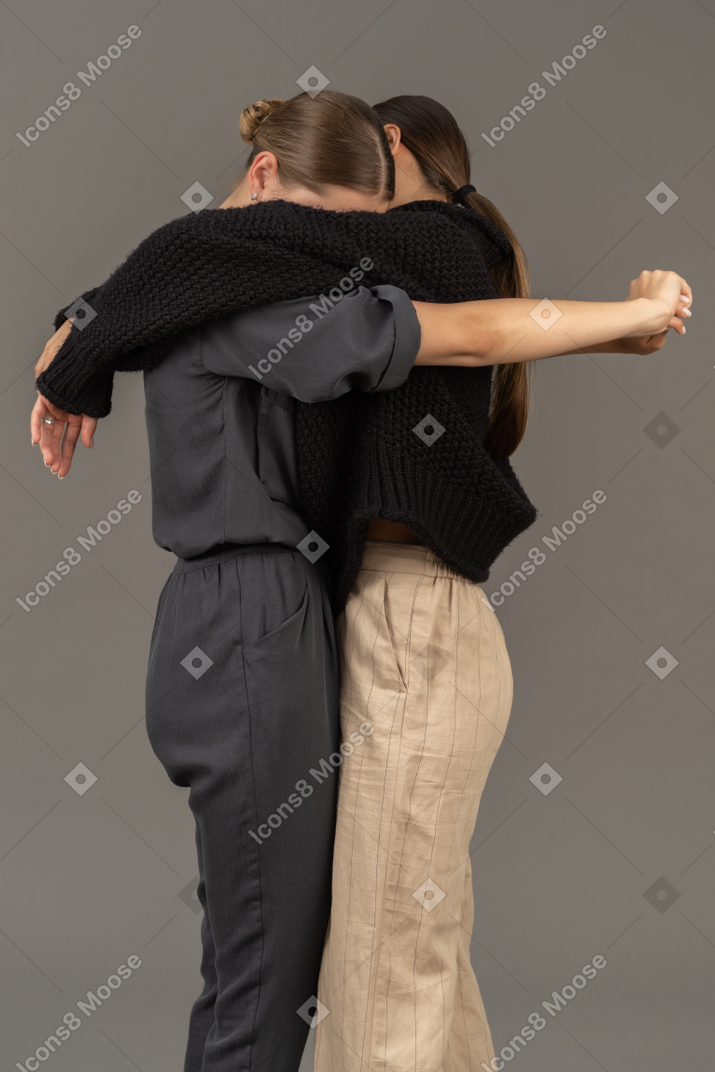 Two women hugging