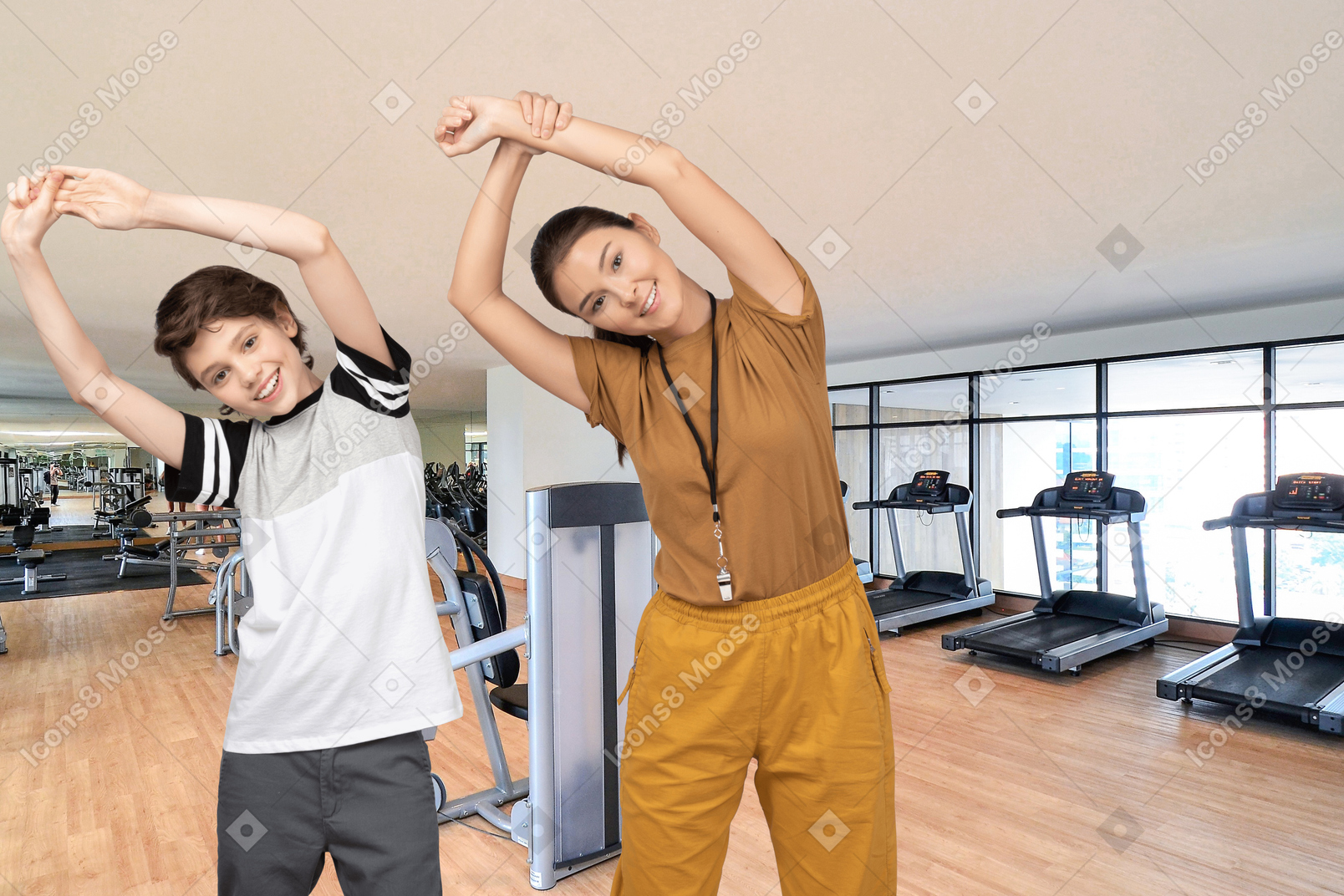 Mulher e menino malhando em uma academia