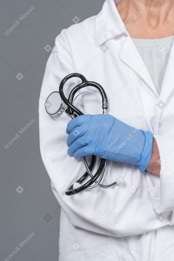 A doctor holding a stethoscope