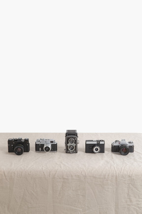 Vintage cameras on table