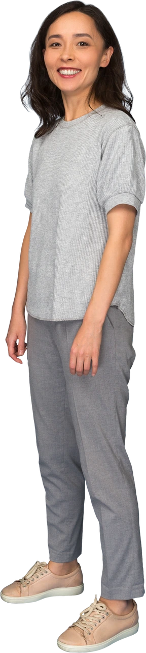 Young woman standing and smiling