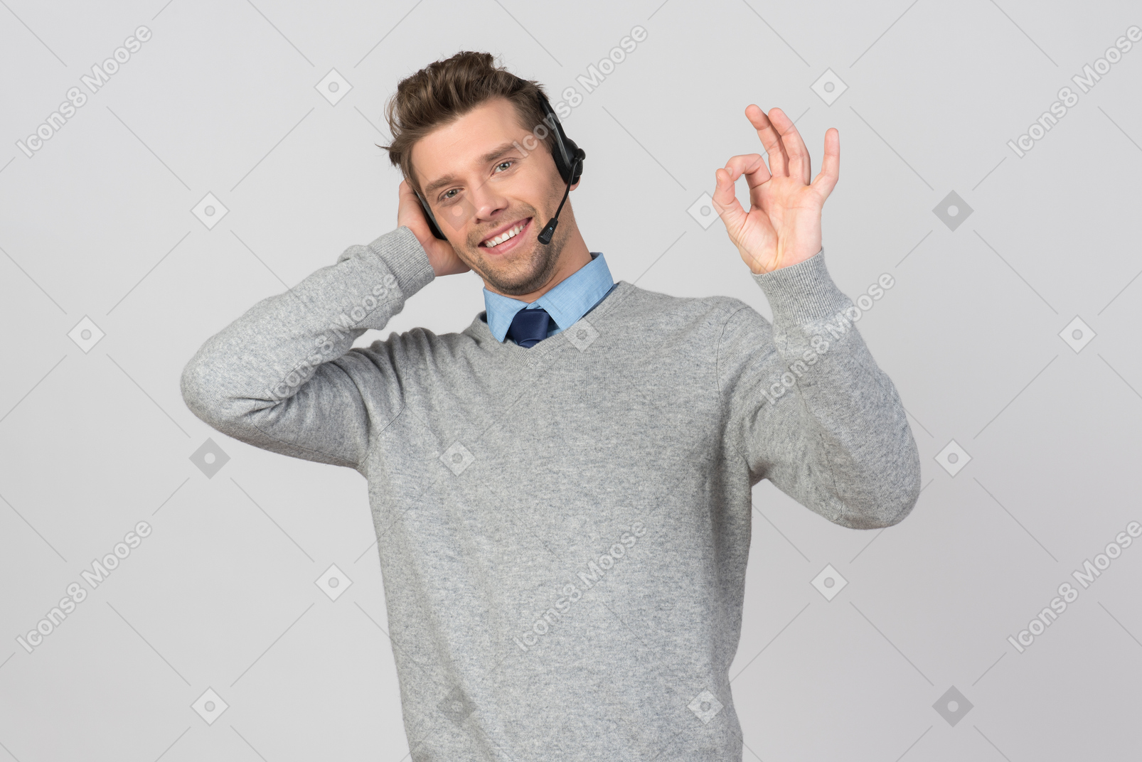 Call center agent showing an ok gesture
